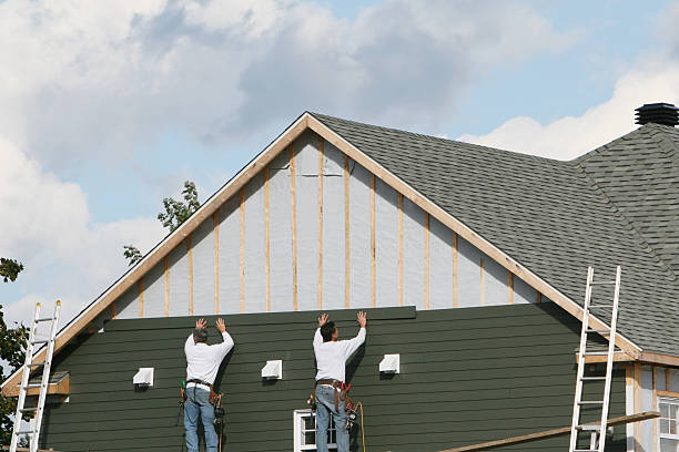 Professional Emergency Siding Repair technician working in Brightwaters, NY